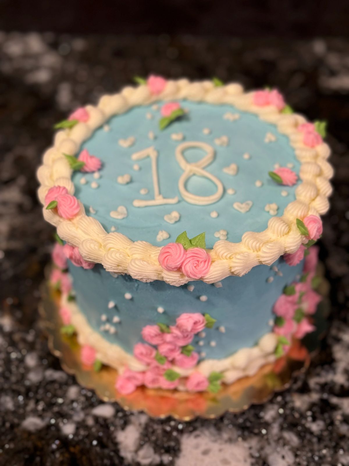 Custom blue birthday cake with pink buttercream roses by Becca Bakes Owensboro KY