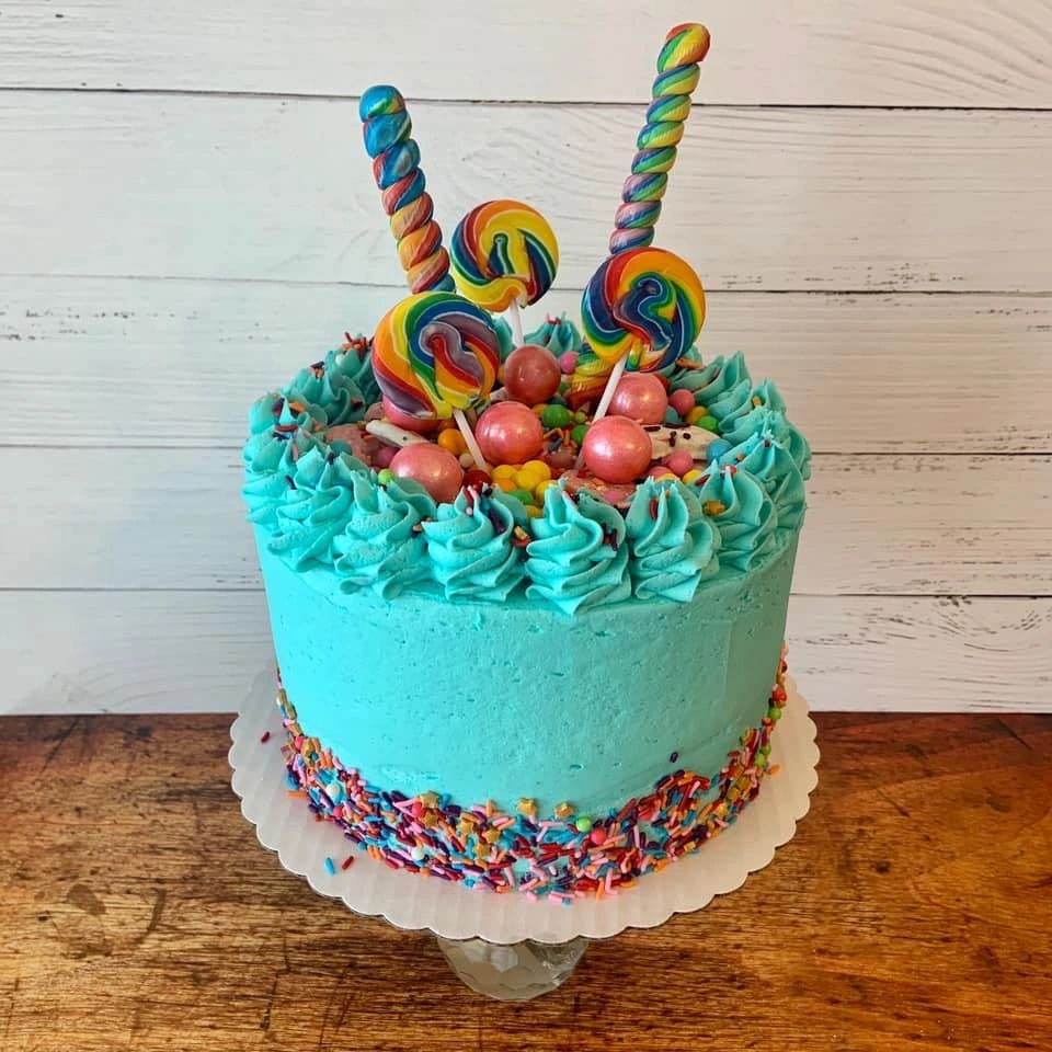Candy Extreme funfetti cake loaded with candy by Becca Bakes