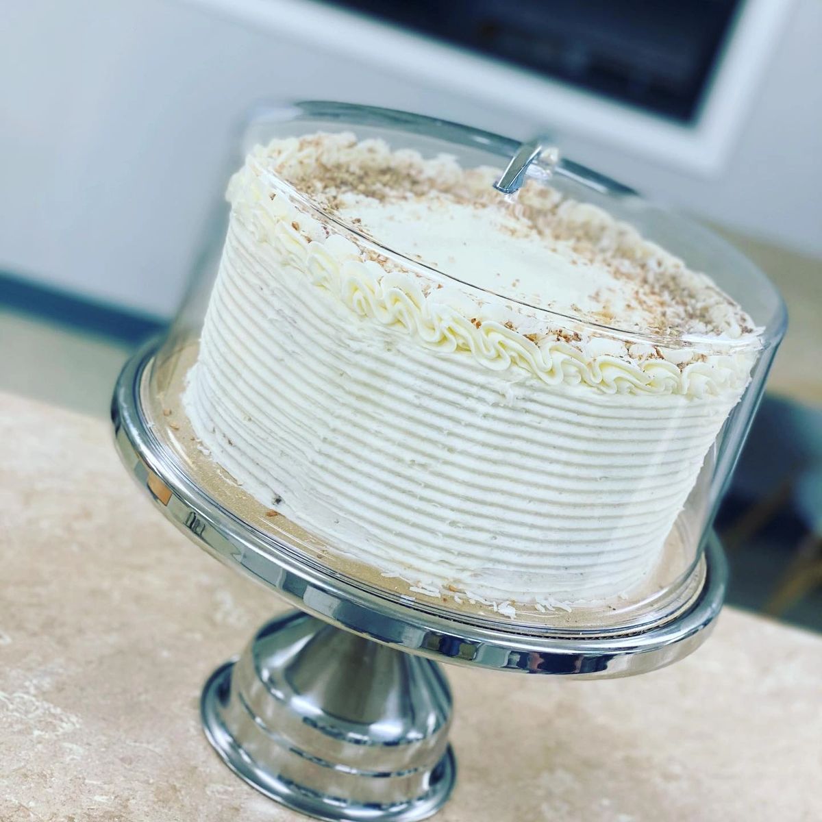 Italian cream cake with toasted coconut by Becca Bakes Owensboro